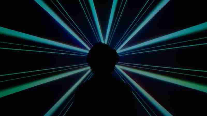 Beams emanating from someone's mind.