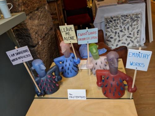 The Protesters by Morag and David Reekie, make a stand at GalleryTen on William Street. Their messages seem fitting for Well Being in the West End. Perhaps it's a vote for human connection amid the busy, tech-driven, isolating world?