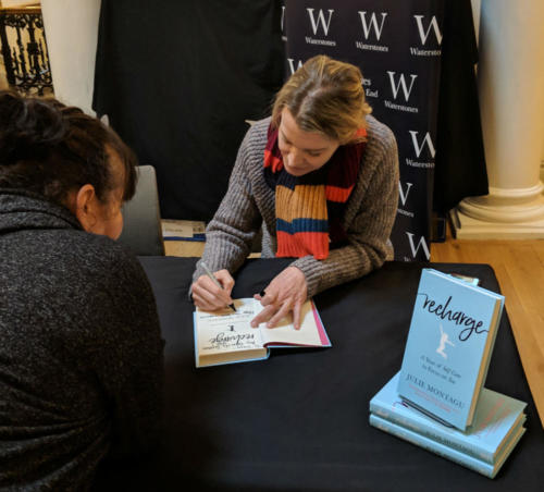 Yoga star Julie Montagu signed copies of her fourth book, "Recharge."